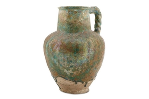 A BLACK-PAINTED TURQUOISE-GLAZED WATER JUG Possibl