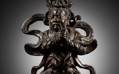 A BRONZE WARRIOR FIGURE OF A GUARDIAN KING, MING DYNASTY