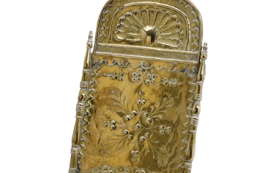 A Baroque second half 17th century embossed brass wall-light, arched tgop with...