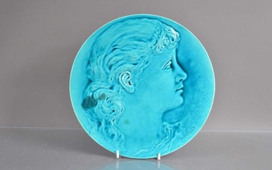 A Burmantofts art pottery turquoise glazed earthenware pottery relief portrait wall plaque