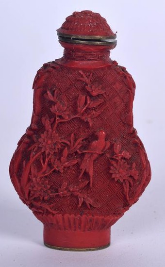 A CHINESE CARVED CINNABAR LACQUER SNUFF BOTTLE