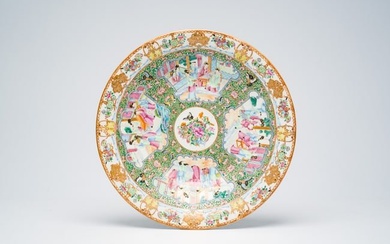 A Chinese Canton famille rose dish with palace scenes, antiquities and 'twin fish', 19th C.