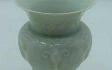 A Chinese Yingqing porcelain incense burner carved in