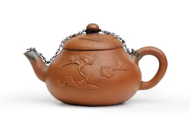 A Chinese Yixing red clay teapot with applied decoration Early Qing dynasty,...