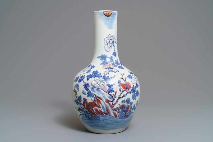 A Chinese blue, white and underglaze red 'rooster' vase, 19th C.