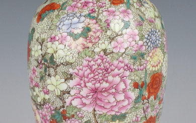 A Chinese famille rose enamelled millefleurs porcelain vase, mark of Qianlong but Republic period, o