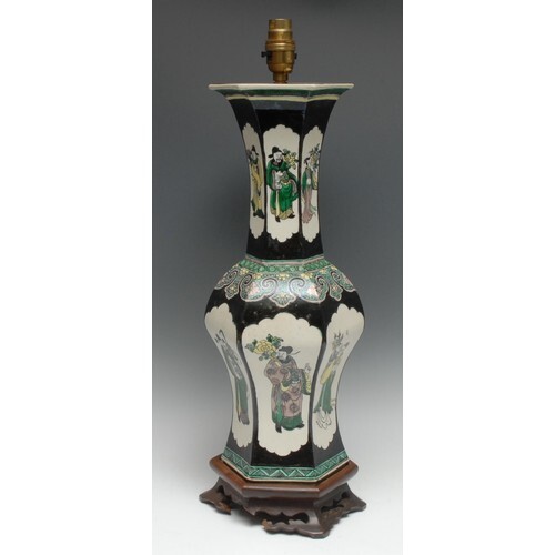 A Chinese hexagonal baluster vase, painted in the famille no...