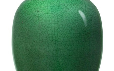A Chinese porcelain monochrome apple-green crackle-glazed jar, 18th century, of ovoid form, covered in an allover apple-green crackled glaze that thins to white at the rim, 15.7cm high Provenance: Private North London collection