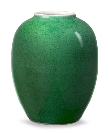 A Chinese porcelain monochrome apple-green crackle-glazed jar, 18th century, of ovoid form, covered in an allover apple-green crackled glaze that thins to white at the rim, 15.7cm high Provenance: Private North London collection