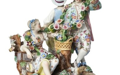 A Continental Meissen style porcelain figure group,...