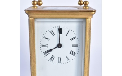 A FRENCH BRASS CARRIAGE CLOCK. 13.5 cm high inc handle.