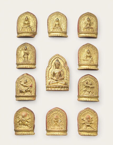A GROUP OF ELEVEN GILT-LACQUERED TERRACOTTA VOTIVE PLAQUES, TSHA TSHA, QIANLONG INCISED AND GILT SIX-CHARACTER MARKS AND OF THE PERIOD (1736-1795)