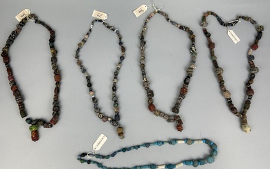 A GROUP OF FOUR POLYCHROME MOSAIC GLASS BEAD NECKLACES,...