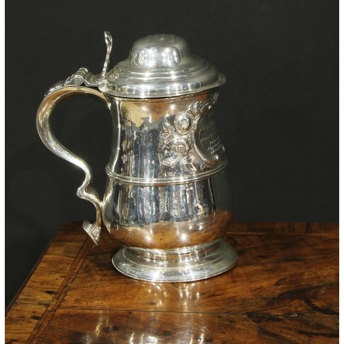A George III silver baluster tankard, hinged domed cover, ch...