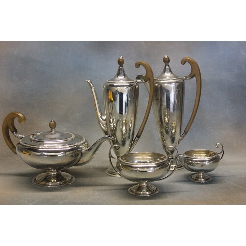 A George V silver five piece tea and coffee set, with decor...