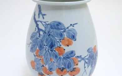 A Japanese vase of ovoid form with hand painted