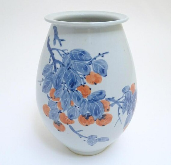 A Japanese vase of ovoid form with hand painted