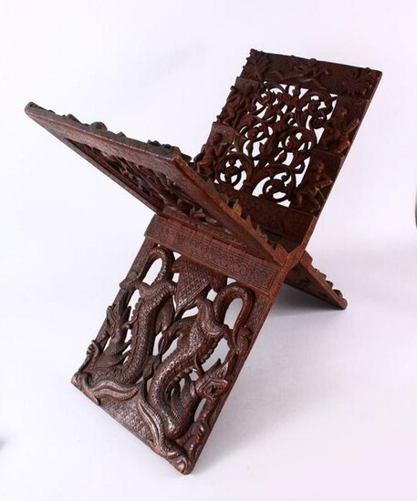 A LARGE CHINESE SIAMESE CARVED WOODEN BOOK STAND