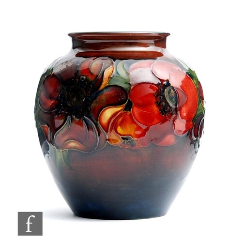 A Moorcroft vase of ovoid form with a flared neck decorated ...