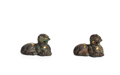 A PAIR OF INLAID AND GILDED BRONZE TIGER WEIGHTS Han...