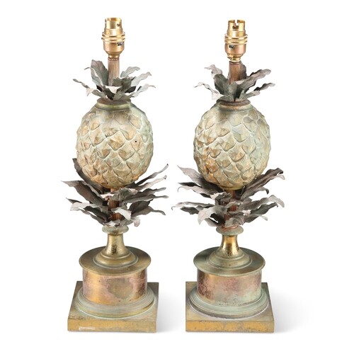 A PAIR OF TÔLE PINEAPPLE TABLE LAMPS, with naturalistic leaf...