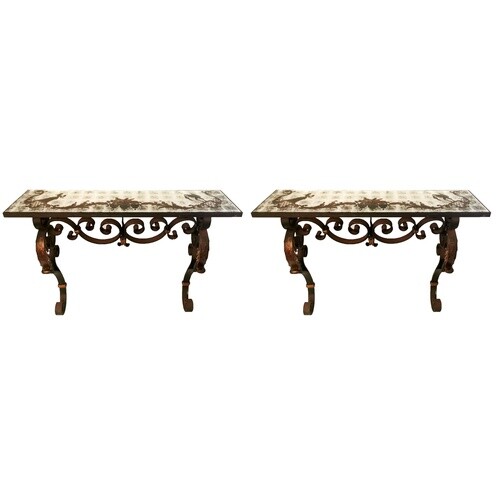 A PAIR OF WROUGHT IRON AND GILT EMBELLISHED CONSOLE TABLES ...