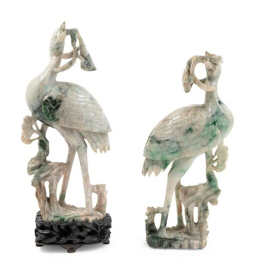 A Pair of Chinese Apple Green and White Jadeite Figures