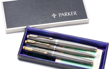 A SET OF THREE VINTAGE STERLING SILVER PARKER 75 PENS; 2 fountain pens and a ballpoint in box with box of refills.