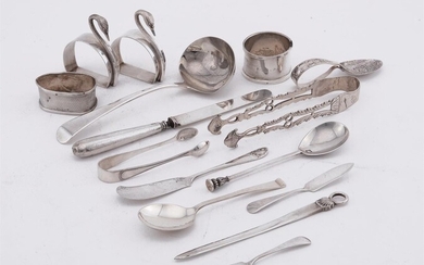 A SMALL COLLECTION OF FLATWARE AND FOUR NAPKIN RINGS