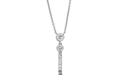 A STAR RUBY AND DIAMOND PENDANT NECKLACE set with a