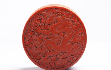 A VERY RARE CHINESE CINNABAR LACQUER 'DRAGON' BOX AND COVER