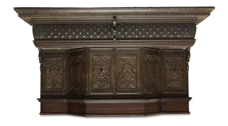 A Victorian Jacobean style oak fire surround, incorporating four 16th century panels from Bodington Hall, North Wales, with lappeted frieze above a breakfront with inset panels, on acanthus capped jambs, 206cm high, 183cm wide, 54cm deep, the...