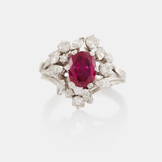A WA Bolin ring set with a faceted pink sapphire and round brilliant- and navette-cut diamonds