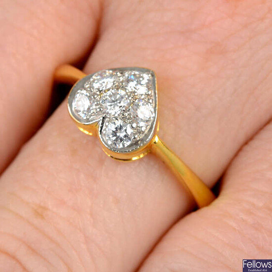 A brilliant-cut diamond heart-shape ring.