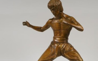 A bronze figure of Bruce Lee, 13½" high