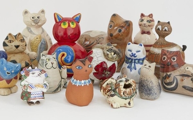 A collection of pottery cats, of stylised rotund form, of varying makers, designs and sizes, tallest 18.5cm high (lot)