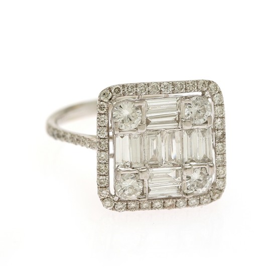 A diamond ring set with numerous baguette and brilliant-cut diamonds weighing a total of app. 1.44 ct., mounted in 18k white gold. H/VS-P1. Size 53.