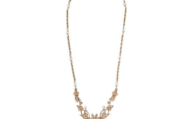 A fourteen karat gold and seed pearl necklace