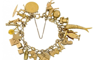 A gold charm bracelet, the 9ct gold bracelet suspending various mid 20th century gold charms, including: an articulated fish; a windmill; a pendant mounted half-sovereign; and various animals; gross weight 59.3g