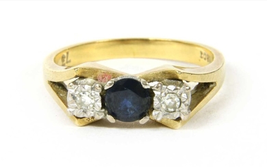 A gold sapphire and diamond ring