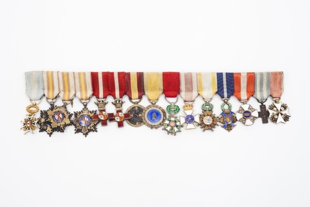A group of insignias and miniatures