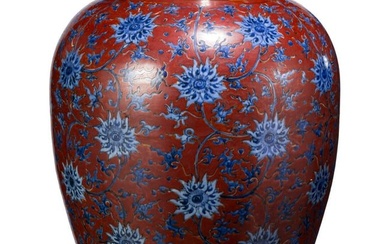 A large Chinese red grounded vase with blue lotus flowers, probably late Ming dynasty