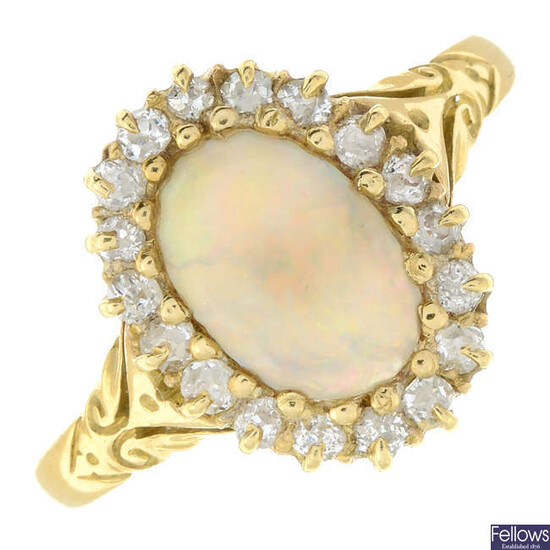 A late 19th century 18ct gold old-cut diamond and opal cluster ring.