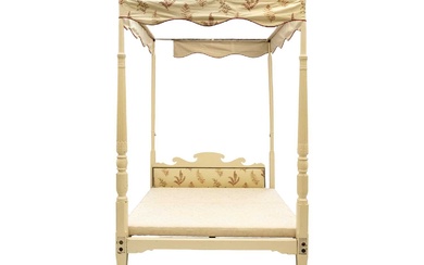 A late Victorian mahogany painted four poster bed.