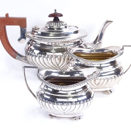 A late Victorian silver 3-piece tea set, comprising half flu...
