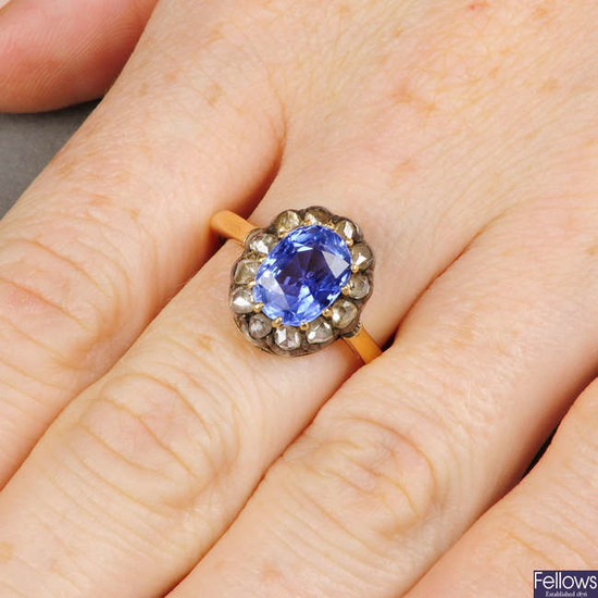 A late Victorian, silver and 18ct gold Sri Lankan sapphire and rose-cut diamond cluster ring.