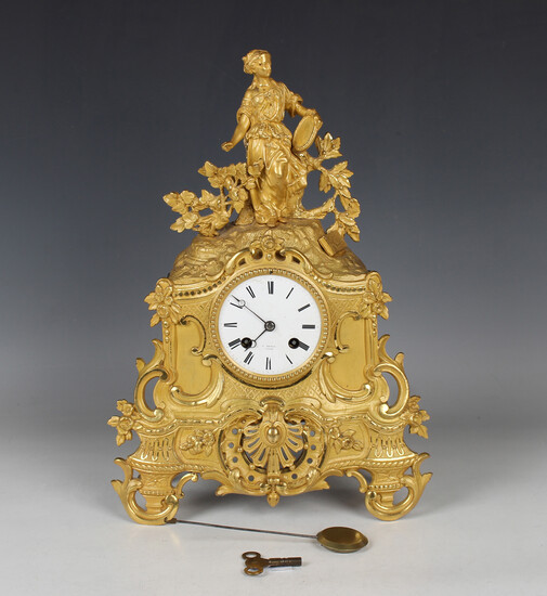 A mid-19th century French ormolu cased mantel clock with eight day movement striking on a bell via a