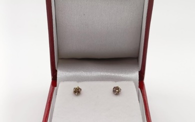 A pair of 18ct white gold 6-claw diamond solitaire studs, wi...