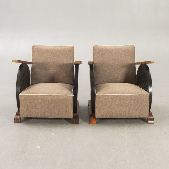 A pair of Art Deco style walnut armchairs later part of the 20th century