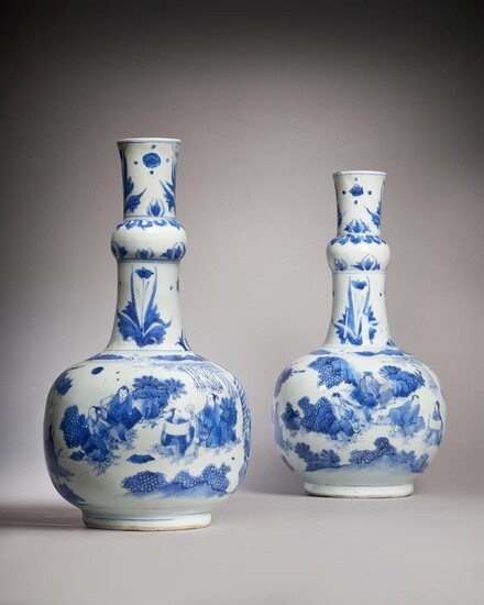 A pair of Chinese 'Seven Scholars in a Bamboo Grove' blue and white bottle vases